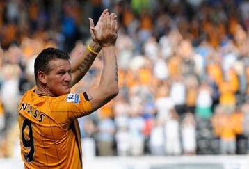 HULL, ENGLAND - AUGUST 09: Dean Windass of Hull City applauds the fans during the Pre Season Friendly between Hull City and Aberdeen at the KC Stadium on August 9, 2009 in Hull, England.  (Photo by Laurence Griffiths/Getty Images)