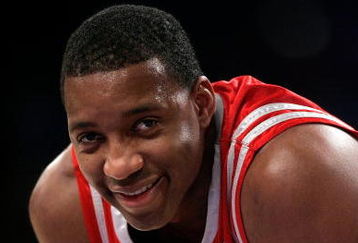 LOS ANGELES, CA - OCTOBER 30:  Tracy McGrady #1 of the Houston Rockets looks on with a smile during a game against the Los Angeles Lakers at Staples Center on October 30, 2007 in Los Angeles, California.  The Rockets won 95-93.  NOTE TO USER: User expressly acknowledges and agrees that, by downloading and or using this Photograph, user is consenting to the terms and conditions of the Getty Images License Agreement.  (Photo by Jeff Gross/Getty Images)