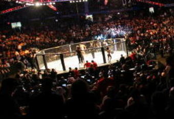 CHICAGO- OCTOBER 25:  People attend the UFC 90 at UFC's Ultimate Fight Night at Allstate Arena on October 25, 2008 in Chicago, Illinois. (Photo by Tasos Katopodis/Getty Images)
