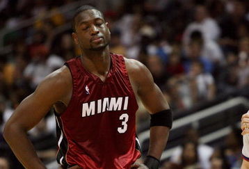ATLANTA - MAY 03:  Dwyane Wade #3 of the Miami Heat reacts after talking with official Joe Crawford while taking on the Atlanta Hawks during Game Seven of the Eastern Conference Quarterfinals at Philips Arena on May 3, 2009 in Atlanta, Georgia. The Hawks defeated the Heat 91-78. NOTE TO USER: User expressly acknowledges and agrees that, by downloading and/or using this Photograph, user is consenting to the terms and conditions of the Getty Images License Agreement.  (Photo by Doug Benc/Getty Images)
