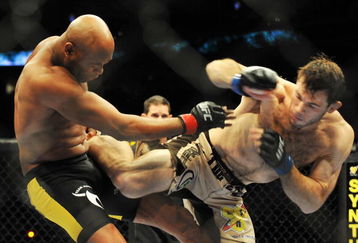 PHILADELPHIA - AUGUST 08:  (L-R) Anderson Silva battles  Forrest Griffin during their light heavyweight bout at UFC 101: Declaration at the Wachovia Center on August 8, 2009 in Philadelphia, Pennsylvania.  (Photo by Jon Kopaloff/Getty Images)