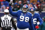 EAST RUTHERFORD, NJ - DECEMBER 07:  Fred Robbins #98 of the New York Giants in action against the Philadelphia Eagles during their game on December 7, 2008 at Giants Stadium in East Rutherford, New Jersey.  (Photo by Al Bello/Getty Images)