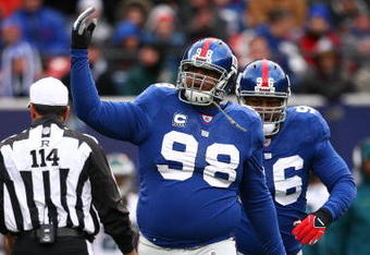 EAST RUTHERFORD, NJ - DECEMBER 07:  Fred Robbins #98 of the New York Giants in action against the Philadelphia Eagles during their game on December 7, 2008 at Giants Stadium in East Rutherford, New Jersey.  (Photo by Al Bello/Getty Images)