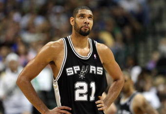 DALLAS - APRIL 25:  Forward Tim Duncan #21 of the San Antonio Spurs during play against the Dallas Mavericks in Game Four of the Western Conference Quarterfinals during the 2009 NBA Playoffs at American Airlines Center on April 25, 2009 in Dallas, Texas. NOTE TO USER: User expressly acknowledges and agrees that, by downloading and or using this photograph, User is consenting to the terms and conditions of the Getty Images License Agreement.  (Photo by Ronald Martinez/Getty Images)
