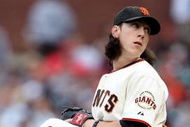 SAN FRANCISCO - AUGUST 01:  Tim Lincecum #55 of the San Francisco Giants pitches against the Philadelphia Phillies during a Major League Baseball game at AT&T Park on August 1, 2009 in San Francisco, California.  (Photo by Jed Jacobsohn/Getty Images)