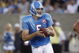 CANTON, OH - AUGUST 9: Kerry Collins #5 of the Tennessee Titans looks to pass the football against the Buffalo Bills during the Pro Football Hall of Fame Game at Fawcett Stadium on August 9, 2009 in Canton, Ohio. The Titans defeated the Bills 21-18. (Photo by Joe Robbins/Getty Images)