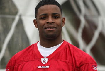 SANTA CLARA, CA - MAY 01:  Michael Crabtree #15 of the San Francisco 49ers looks on at practice during the 49ers Minicamp at their training facilities on May 1, 2009 in Santa Clara, California. Crabtree was the 49ers first round draft pick.  (Photo by Jed Jacobsohn/Getty Images)