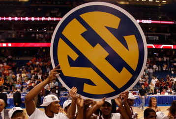 TAMPA, FL - MARCH 15:  Members of the Mississippi State Bulldogs celebrate after defeating the Tennessee Volunteers 64-61 to win the Championship game of the SEC Men's Basketball Tournament on March 15, 2009 at The St. Pete Times Forum in Tampa, Florida.  (Photo by Chris Graythen/Getty Images)