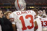 TEMPE, AZ - JANUARY 3:  Freshman running back Maurice Clarett #13 of the Ohio State Buckeyes takes in the BCS Championship victory over the University of Miami Hurricanes in the Tostitos Fiesta Bowl at Sun Devil Stadium on January 3, 2003  in Tempe, Arizona.  Ohio State won the game 31-24 in double-overtime, winning the NCAA National Championship.  (Photo by Brian Bahr/Getty Images)