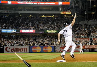 NEW YORK - AUGUST 09:  Mark Teixeira #25 of the New York Yankees rounds the bases on a solo home run in the eighth inning against the Boston Red Sox during their game on August 9, 2009 at Yankee Stadium in the Bronx Borough of New York City.  (Photo by Jeff Zelevansky/Getty Images)
