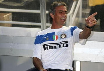 PASADENA, CA - JULY 21:  Inter Milan Head Coach Jose Mourinho has a laugh on the bench prior the World Football Challenge between Chelsea FC and Inter Milan at the Rose Bowl on July 21, 2009 in Pasadena, California. Chelsea FC defeated Inter Milan 2-0. (Photo by Stephen Dunn/Getty Images)