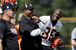 GEORGETOWN, KY - JULY 31:  Chad Ochocinco #85 (R) of the Cincinnati Bengals and Head Coach Marvin Lewis (middle with white sleeves) share a lauugh during the Bengals training camp at Georgetown College on July 31, 2009 in Georgetown, Kentucky.  (Photo by Andy Lyons/Getty Images)