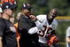 GEORGETOWN, KY - JULY 31:  Chad Ochocinco #85 (R) of the Cincinnati Bengals and Head Coach Marvin Lewis (middle with white sleeves) share a lauugh during the Bengals training camp at Georgetown College on July 31, 2009 in Georgetown, Kentucky.  (Photo by Andy Lyons/Getty Images)