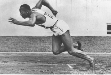 1-16 Aug 1936:  Jesse Owens of the USA starts the 200 metres event at the 1936 Olympic Games in Berlin. Owens won the gold medal in this event with a time of 20.7 seconds. \ Mandatory Credit: IOC Olympic Museum  /Allsport
