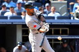 NEW YORK - JULY 06:  Alex Rios #15 of the Toronto Blue Jays bats against the New York Yankees on July 6, 2009 at Yankee Stadium in the Bronx borough of New York City.  (Photo by Jim McIsaac/Getty Images)