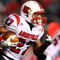 PISCATAWAY, NJ - DECEMBER 04: Doug Beaumont #27 of the Louisville Cardinals runs with the ball against the Rutgers Scarlet Knights at Rutgers Stadium on December 4, 2008 in Piscataway, New Jersey. (Photo by Jim McIsaac/Getty Images)