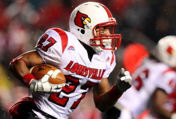 PISCATAWAY, NJ - DECEMBER 04:  Doug Beaumont #27 of the Louisville Cardinals runs with the ball against the Rutgers Scarlet Knights at Rutgers Stadium on December 4, 2008 in Piscataway, New Jersey.  (Photo by Jim McIsaac/Getty Images)