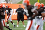 BEREA, OH - AUGUST 07:  Head coach Eric Mangini of the Cleveland Browns watches players warm up during training camp at the Cleveland Browns Training and Administrative Complex on August 7, 2009 in Berea, Ohio.  (Photo by Gregory Shamus/Getty Images)