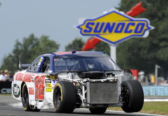 WATKINS GLEN, NY - AUGUST 10:  Dale Earnhardt Jr. races the #88 National Guard/AMP Energy Chevrolet during the NASCAR Sprint Cup Series Heluva Good! Sour Cream Dips at Watkins Glen International on August 10, 2009 in Watkins Glen, New York.  (Photo by John Harrelson/Getty Images for NASCAR)