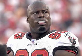 TAMPA, FL - AUGUST 10:  Defensive end Kevin Carter #93  of the Tampa Bay Buccaneers watches play from the sideline during a preseason game against the New England Patriots at Raymond James Stadium on August 10, 2007 in Tampa, Florida. The Bucs won 13 - 10. (Photo by Al Messerschmidt/Getty Images)