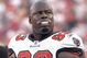 TAMPA, FL - AUGUST 10: Defensive end Kevin Carter #93 of the Tampa Bay Buccaneers watches play from the sideline during a preseason game against the New England Patriots at Raymond James Stadium on August 10, 2007 in Tampa, Florida. The Bucs won 13 - 10. (Photo by Al Messerschmidt/Getty Images)