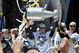 PITTSBURGH - JUNE 15: Sidney Crosby #87 of the Pittsburgh Penguins holds the Stanley Cup as Maxime Talbot #25 of the Penguins sprays the crowd during Stanley Cup Champion Victory Parade on June 15, 2009 in Pittsburgh, Pennsylvania. (Photo by Jamie Sabau/Getty Images)