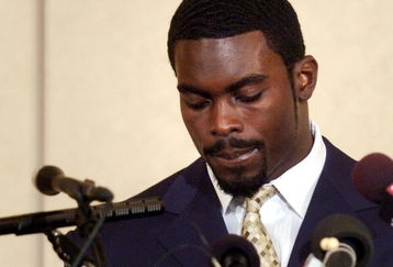 RICHMOND, VA - AUGUST 27:  Atlanta Falcons quarterback Michael Vick speaks to reporters at the Omni Richmond Hotel after agreeing to a guilty plea on charges stemming from his involvement in a dogfighting ring August 27, 2007, in Richmond, Virginia.  (Photo by Jonathan Ernst/Getty Images)