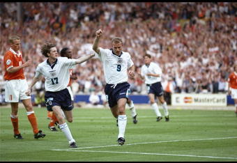 18 Jun 1996:  Steve McManaman helps Alan Shearer celebrate his second goal for England against Holland in the Group A match at Wembley during the European Football Championships. England beat Holland 4-1.