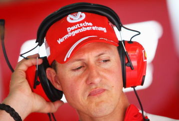 KUALA LUMPUR, MALAYSIA - APRIL 03:  Former Ferrari Formula One World Champion Michael Schumacher of Germany is seen in the Ferrari team garage during practice for the Malaysian Formula One Grand Prix at the Sepang Circuit on April 3, 2009 in Kuala Lumpur, Malaysia.  (Photo by Mark Thompson/Getty Images)