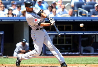 NEW YORK - JULY 06:  Alex Rios #15 of the Toronto Blue Jays bats against the New York Yankees on July 6, 2009 at Yankee Stadium in the Bronx borough of New York City.  (Photo by Jim McIsaac/Getty Images)