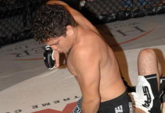 STUDIO CITY, CA - MAY 19:  MMA fighters Jake Shields (bottom) and Nick Diaz demonstrate MMA fighting techniques at CBS's 'Elite XC Saturday Night Fights' Press Conference at CBS Radford Studios on May 19, 2008 in Studio City, California.  (Photo by Stephen Shugerman/Getty Images)