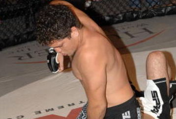 STUDIO CITY, CA - MAY 19:  MMA fighters Jake Shields (bottom) and Nick Diaz demonstrate MMA fighting techniques at CBS's 'Elite XC Saturday Night Fights' Press Conference at CBS Radford Studios on May 19, 2008 in Studio City, California.  (Photo by Stephen Shugerman/Getty Images)