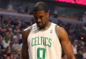 CHICAGO - MARCH 17: Leon Powe #0 of the Boston Celtics tests out an injured knee near the bench during a game against the Chicago Bulls on March 17, 2009 at the United Center in Chicago, Illinois. NOTE TO USER: User expressly acknowledges and agreees that, by downloading and/or using this Photograph, User is consenting to the terms and conditions of the Getty Images License Agreement. (Photo by Jonathan Daniel/Getty Images)