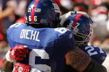 TAMPA, FL - JANUARY 06:  Brandon Jacobs #27 of the New York Giants celebrates his touchdown with teammate David Diehl #66 in the second quarter of the NFC Wild Card game against Tampa Bay Buccaneers making it 7-7 at Raymond James Stadium on January 6, 2008 in Tampa, Florida.  (Photo by Matthew Stockman/Getty Images)