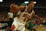 CHICAGO - APRIL 26: Derrick Rose #1 of the Chicago Bulls drives past Rajon Rondo #9 of the Boston Celtics in Game Four of the Eastern Conference Quarterfinals during the 2009 NBA Playoffs at the United Center on April 26, 2009 in Chicago, Illinois. The Bulls defeated the Celtics 121-118 in double overtime. NOTE TO USER: User expressly acknowledges and agreees that, by downloading and/or using this Photograph, User is consenting to the terms and conditions of the Getty Images License Agreement. Photo by Jonathan Daniel/Getty Images)