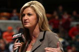 INDIANAPOLIS - MARCH 12:  ESPN's Erin Andrews performs an on camera report as the Michigan Wolveriens play against the Iowa Hawkeyes during the first round of the Big Ten Men's Basketball Tournament at Conseco Fieldhouse on March 12, 2009 in Indianapolis, Indiana.  (Photo by Jonathan Daniel/Getty Images)