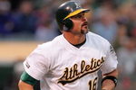 OAKLAND, CA - MAY 23:  Jason Giambi #16 of the Oakland Athletics watches his 400th career home run go over the outfield wall in the fourth inning of their game against the Arizona Diamondbacks at the Oakland Coliseum on May 23, 2009 in Oakland, California.  (Photo by Ezra Shaw/Getty Images)