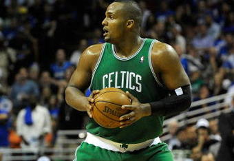 ORLANDO, FL - MAY 14:  Glen Davis #11 of the Boston Celtics looks to pass against the Orlando Magic in Game Six of the Eastern Conference Semifinals during the 2009 NBA Playoffs at Amway Arena on May 14, 2009 in Orlando, Florida.  NOTE TO USER: User expressly acknowledges and agrees that, by downloading and/or using this Photograph, user is consenting to the terms and conditions of the Getty Images License Agreement.  (Photo by Sam Greenwood/Getty Images)