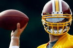 ASHBURN, VA - JULY 30:  Washington Redskins quarterback Colt Brennan (#5) drops back to pass during drills on opening day of training camp July 30, 2009 in Ashburn, Virginia.  (Photo by Win McNamee/Getty Images)