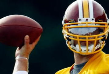ASHBURN, VA - JULY 30:  Washington Redskins quarterback Colt Brennan (#5) drops back to pass during drills on opening day of training camp July 30, 2009 in Ashburn, Virginia.  (Photo by Win McNamee/Getty Images)