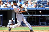 NEW YORK - JULY 06:  Alex Rios #15 of the Toronto Blue Jays bats against the New York Yankees on July 6, 2009 at Yankee Stadium in the Bronx borough of New York City.  (Photo by Jim McIsaac/Getty Images)