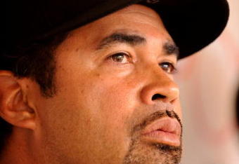 ST. PETERSBURG, FL - APRIL 16: Manager Ozzie Guillen #13 of the Chicago White Sox talks to the media before play against the Tampa Bay Rays April 16, 2009 at Tropicana Field in St. Petersburg, Florida.  (Photo by Al Messerschmidt/Getty Images)