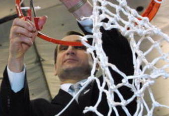 2 Apr 2001:  Head coach Mike Krzyzewski of Duke cuts down his portion of the net after defeating Arizona 82-72 in the NCAA National Championship Game of the Men's Final Four tournament at the Metrodome in Minneapolis, Minnesota.  DIGITAL IMAGE. Mandatory Credit: Brian Bahr/ALLSPORT