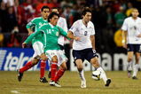 COLUMBUS, OH - FEBRUARY 11:  Clint Dempsey #8 of USA kicks the ball against Israel Martinez #14 of Mexico during a FIFA 2010 World Cup qualifying match in the CONCACAF region on February 11, 2009 at Columbus Crew Stadium in Columbus, Ohio. (Photo by Jamie Sabau/Getty Images)