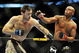PHILADELPHIA - AUGUST 08: Anderson Silva (R) throws a right punch to Forrest Griffin during their light heavyweight bout at UFC 101: Declaration at the Wachovia Center on August 8, 2009 in Philadelphia, Pennsylvania. (Photo by Jon Kopaloff/Getty Images)