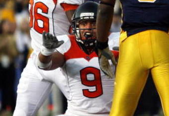 BERKELEY, CA - OCTOBER 13:  Brandon Hughes #36 and Al Afalava #9 of the Oregon State Beavers celebrate a goal line stand that stopped the California Golden Bears from scoring in the third quarter of a college football game, at Memorial Stadium on October 13, 2007 in Berkeley, California.  (Photo by Dino Vournas/Getty Images)