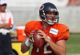 BOURBONNAIS, IL - AUGUST 04: Caleb Hanie #12 of the Chicago Bears drops back to pass during a training camp practice on August 4, 2009 at Olivet Nazarene University in Bourbonnais, Illinois. (Photo by Jonathan Daniel/Getty Images)