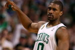 BOSTON - JUNE 08:  Leon Powe #0 of the Boston Celtics celebrates a play in the second half of Game Two of the 2008 NBA Finals against the Los Angeles Lakers on June 8, 2008 at TD Banknorth Garden in Boston, Massachusetts. NOTE TO USER: User expressly acknowledges and agrees that, by downloading and/or using this Photograph, user is consenting to the terms and conditions of the Getty Images License Agreement.  (Photo by Elsa/Getty Images)