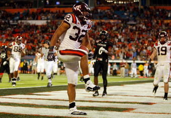 MIAMI - JANUARY 01:  Darren Evans #32 of the Virginia Tech Hokies celebrates after scoring a touchdown during the FedEx Orange Bowl against the Cincinnati Bearcats at Dolphin Stadium on January 1, 2009 in Miami, Florida.  (Photo by Streeter Lecka/Getty Images)