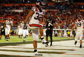 MIAMI - JANUARY 01:  Darren Evans #32 of the Virginia Tech Hokies celebrates after scoring a touchdown during the FedEx Orange Bowl against the Cincinnati Bearcats at Dolphin Stadium on January 1, 2009 in Miami, Florida.  (Photo by Streeter Lecka/Getty Images)